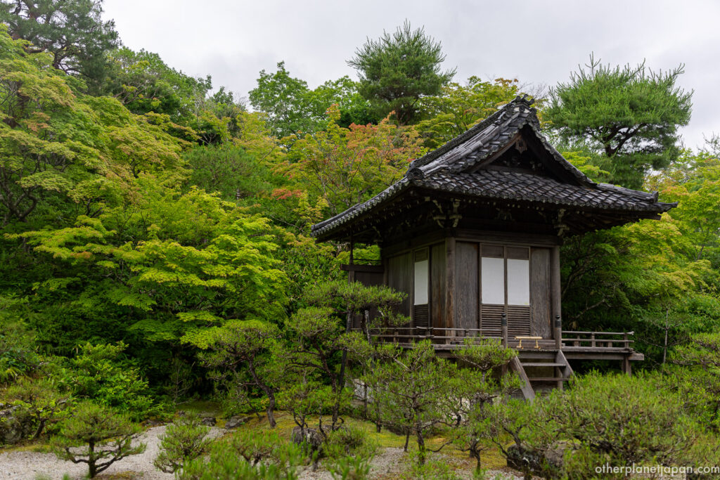 Jibutsudo prayer hall raised on wooden posts among trees at Okochi Sanso, Arashiyama