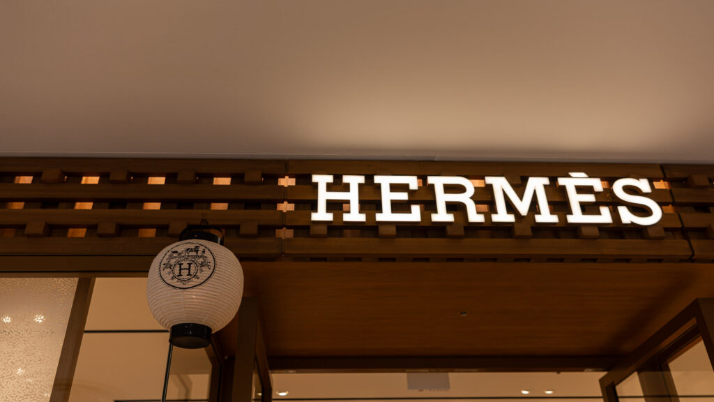 A paper lantern with the Hermes emblem hanging outside the Hermes boutique in Kyoto during Gion Matsuri