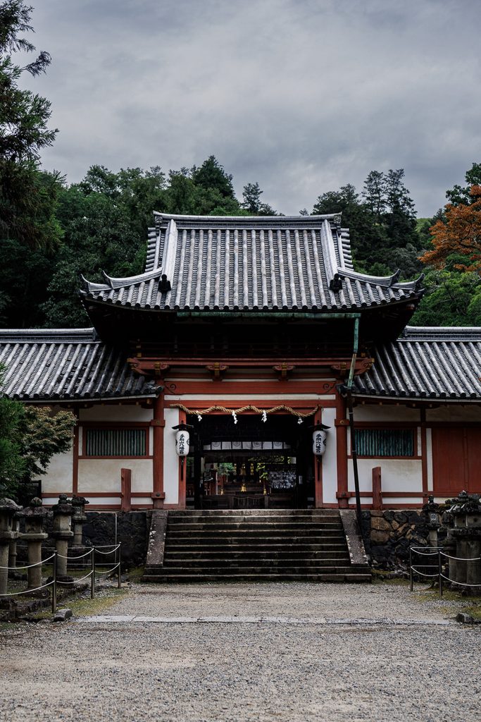 Romon gate of Tamukeyama Hachimangu Shrine with sacred rope and paper lanterns