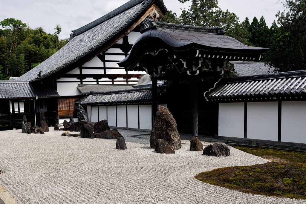 Dry landscape garden with raked gravel and stones beside the hojo at Tofukuji Temple