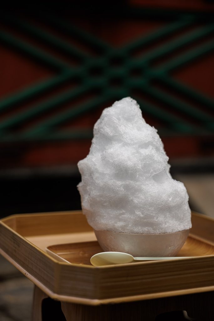 A close view of the pure white kakigori shaved ice served at Himuro Shrine in Nara