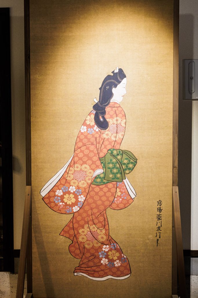 Reproduction of Hishikawa Moronobu's Beauty Looking Back at Uzuwaku Machiya