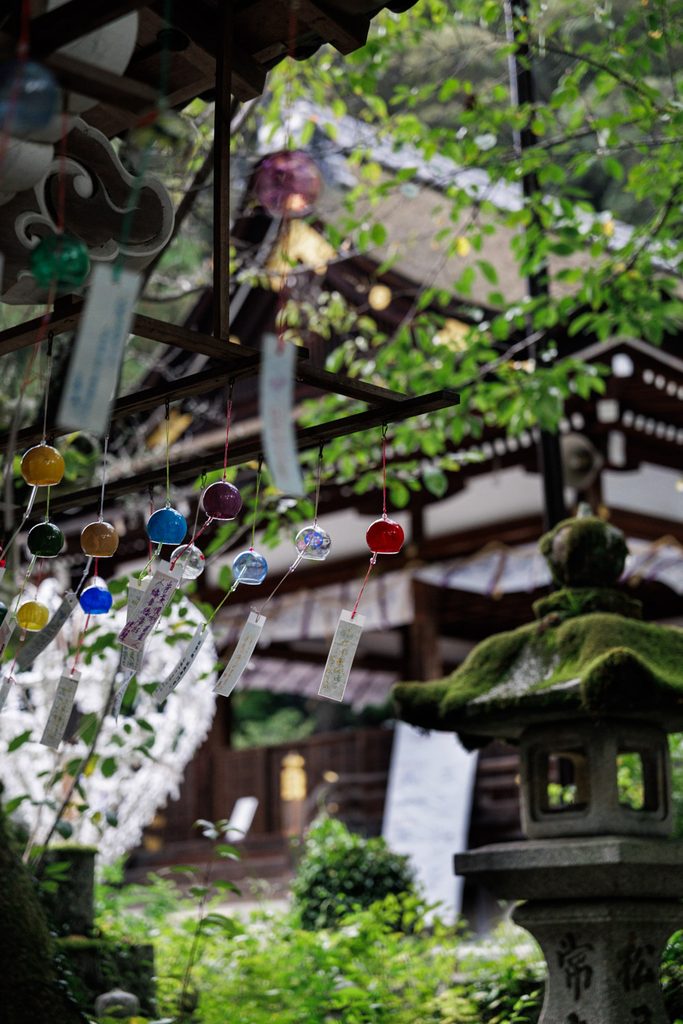 Colored glass wind chimes hung for furin kigan at Matsuo Taisha, a free place to see wind chimes in Kyoto