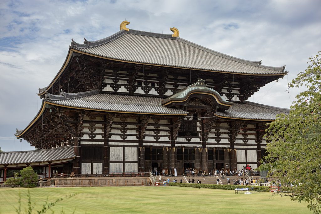 The Great Buddha Hall of Todaiji in Nara with visitors gathered at the entrance steps